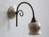 Applique con ceramiche di Ester Marras